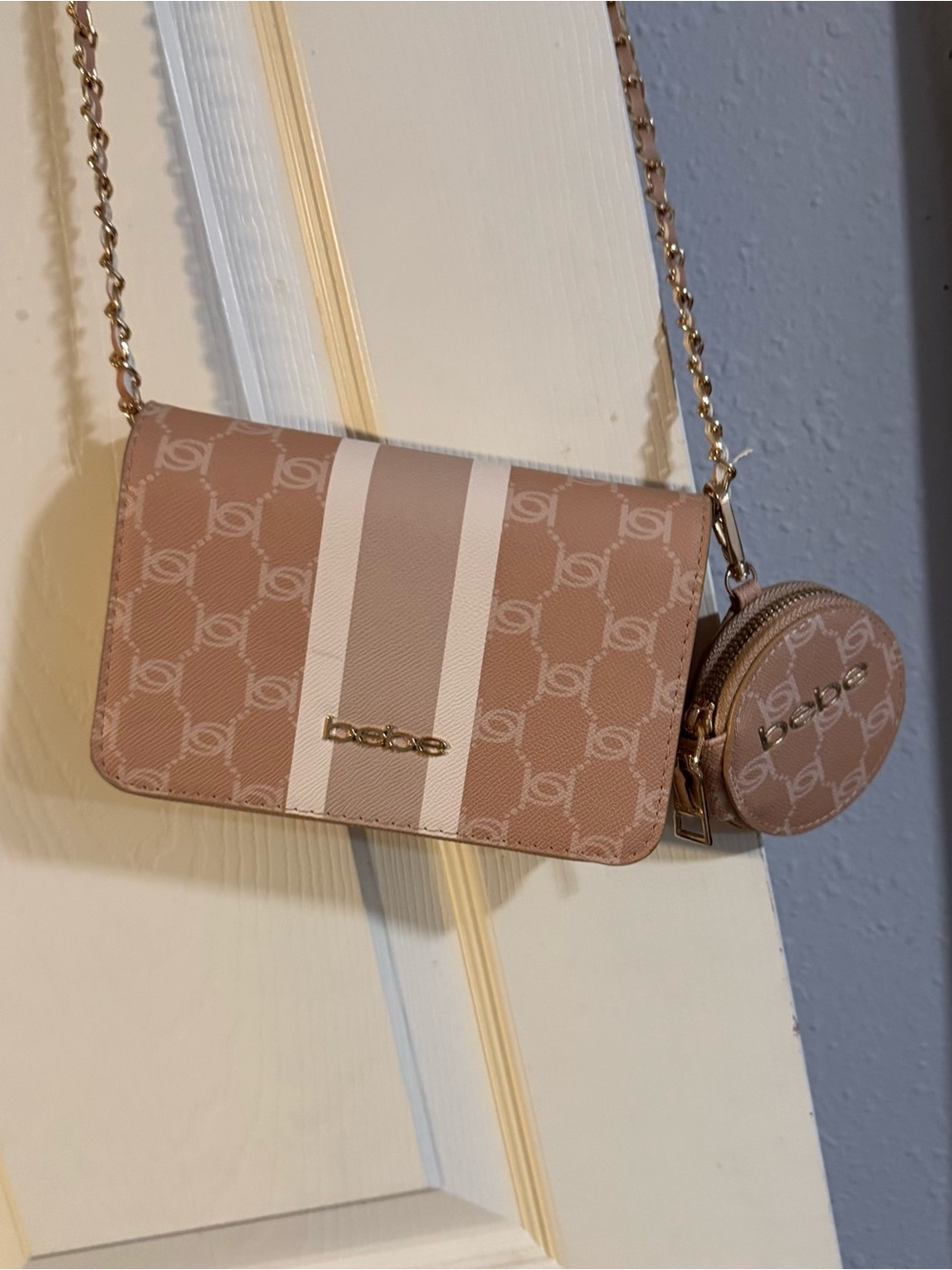 New pinkish-beige Bebe monogram logo crossbody bag with a matching round coin